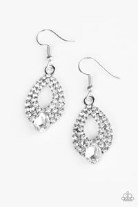 Featuring a regal teardrop cut, a glittery white rhinestone is pressed into the bottom of a white rhinestone encrusted frame, creating a blinding lure. Earring attaches to a standard fishhook fitting.