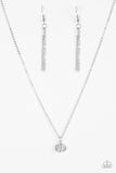 Encrusted in glassy white rhinestones, an asymmetrical silver frame swings from the bottom of a shimmery silver chain for a timeless look. Features an adjustable clasp closure.  Sold as one individual necklace. Includes one pair of matching earrings.