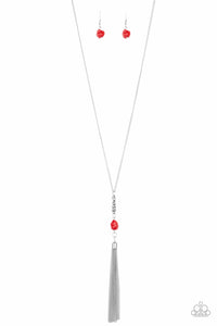 Infused with a lengthened silver chain, a shimmery silver tassel swings from the bottom of a stacked red stone and hammered silver frame for a seasonal look. Infused with a lengthened silver chain, a shimmery silver tassel swings from the bottom of a stacked red stone and hammered silver frame for a seasonal look. Features an adjustable clasp closure. an adjustable clasp closure.