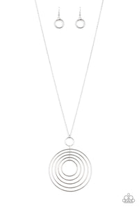 Threaded through a silver fitting, a collection of silver hoops collect into a dizzying pendant at the bottom of a lengthened silver chain for a refined look. Features an adjustable clasp closure.