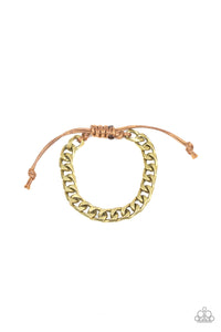 Shiny brown cording knots around the ends of an ornate brass beveled cable chain that is wrapped across the top of the wrist for a versatile look. Features an adjustable sliding knot closure.