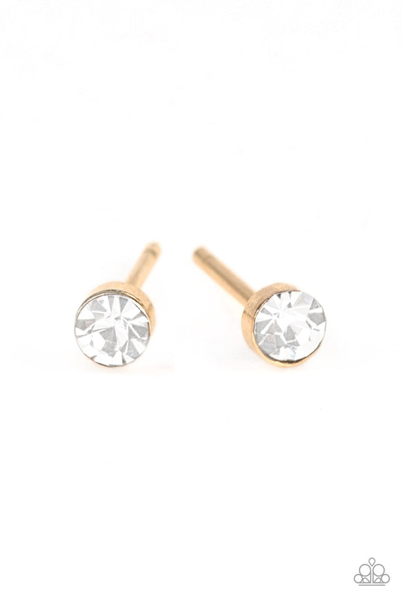 A dainty white cubic zirconia is pressed into the center of a sleek gold frame for a timeless look. Earring attaches to a standard post fitting. Features a daintier design to accommodate multiple ear piercings.