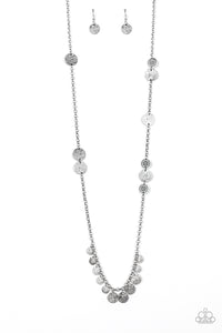 Floral stamped and scratched silver discs trickle along a lengthened silver chain. Hammered and scratched silver discs dangle from the bottom, creating a noisy fringe. Features an adjustable clasp closure.