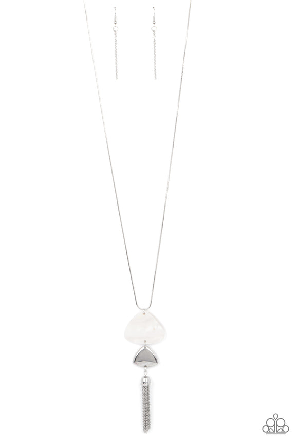 A silver tassel sways from the bottom of two triangular discs, one white shell-like and one silver, for a flirty pendant at the end of a lengthened silver snake chain. Features an adjustable clasp closu