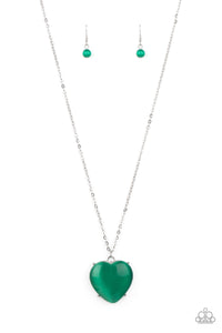 An oversized Mint cat's eye stone frame swings from the bottom of a lengthened silver chain, creating a flirtatious pendant. Features an adjustable clasp closure.