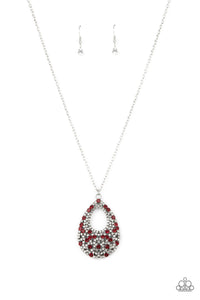 A sparkly explosion of glassy white and fiery red rhinestones haphazardly coalesce into a teardrop frame at the bottom of a lengthened silver chain, creating a twinkly pendant. Features an adjustable clasp closure.