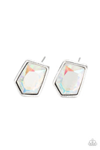 Featuring a raw asymmetrical cut, an iridescent gem is encased inside a sleek silver frame, creating a stellar display. Earring attaches to a standard post fitting.