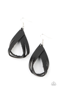 A piece of rustic black leather is spliced into strands that delicately loop into an earthy frame. Earring attaches to a standard fishhook fitting.