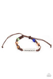 Glassy multicolored cat's eye stone beads are knotted in place along a strand of braided brown cording that attaches to a silver centerpiece stamped in the word, "Wander," for a free-spirited fashion. Features an adjustable sliding knot closure.