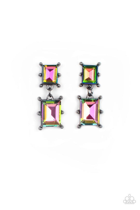 Two brilliant baguette cut oil spill rhinestones, set in classic gunmetal pronged settings, stack one over the other creating a cosmically radiant statement. Earring attaches to a standard post fitting.