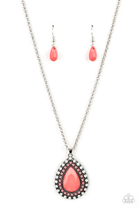 A faceted pink teardrop is pressed into the center of a silver frame bordered in rows of opalescent white and pink beads, creating an ethereal pendant at the bottom of a classic silver chain. Features an adjustable clasp closure.