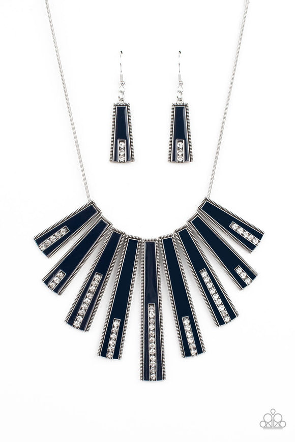 Encased in daintily dotted silver frames, a row of flared silver bars painted in a glossy Navy Blue fans out across the collar. A column of sparkling white rhinestones rises from the bottom of each frame, creating a dramatically deco finish as they sway from a round silver chain. Features an adjustable clasp clo