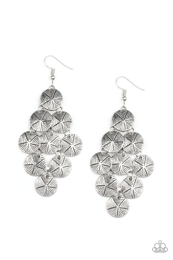 Etched in linear textures, star stamped silver discs cascade from a netted backdrop, creating a noisemaking lure. Earring attaches to a standard fishhook fitting.