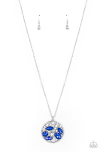 A bubbly collection of white rhinestones and round and marquise Mykonos Blue gems coalesce inside of a silver frame, creating an effervescent pendant at the bottom of a silver chain. Features an adjustable clasp closure.