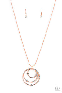 Sporadically encrusted in glittery white rhinestones, shiny copper rings coalesce into a spellbinding pendant at the bottom of a round shiny copper snake chain for a glamorous look. Features an adjustable clasp closure.