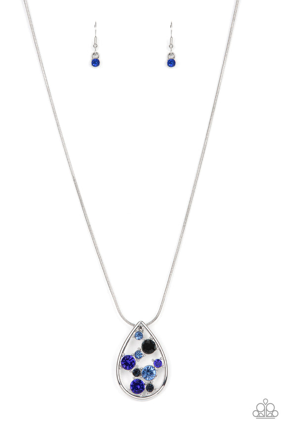 A bubbly collection of blue, Mykonos Blue, and Spring Lake rhinestones coalesce inside an airy silver teardrop, resulting in an effervescently elegant pendant at the bottom of a rounded silver snake chain. Features an adjustable clasp closure.