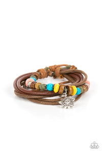 Featuring a silver sun charm, a strand of colorful wooden beads and shiny silver accents joins layers of leathery and shiny brown cording around the wrist for a colorfully urban look. Features an adjustable sliding knot closure.