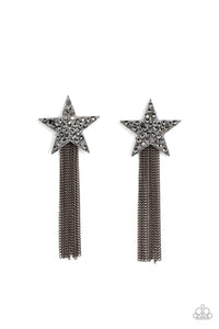 A curtain of gunmetal chains streams out from the bottom of an oversized gunmetal star encrusted in smoky hematite rhinestones, resulting in a stellar tassel. Earring attaches to a standard post fitting.