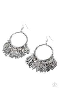 Embossed silver feathers dance from the bottom of a hammered silver hoop, resulting into a free-spirited fringe. Earring attaches to a standard fishhook fitting.