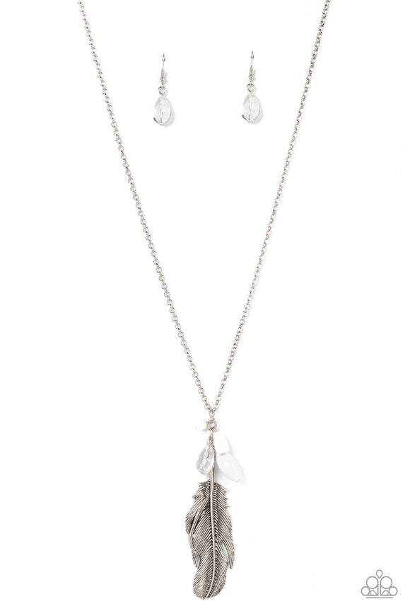 Infused with glassy and acrylic white beads, an oversized silver feather swings from the bottom of an extended silver chain for a fearlessly free-spirited fashion. Features an adjustable clasp closure.