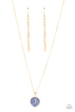 Painted in a shimmery Skydiver lacquer finish, an asymmetrical gold disc is dotted in a dainty gold moon accent as it swings from the bottom of a dainty gold chain below the collar for an enchanting finish. Features an adjustable clasp closur