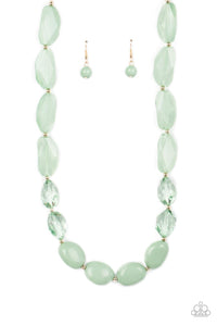 Separated by dainty gold beads, mismatched sections of icy, crystal-like, and Basil acrylic beads are threaded along an invisible wire across the chest for a colorful flair. Features an adjustable clasp closure.