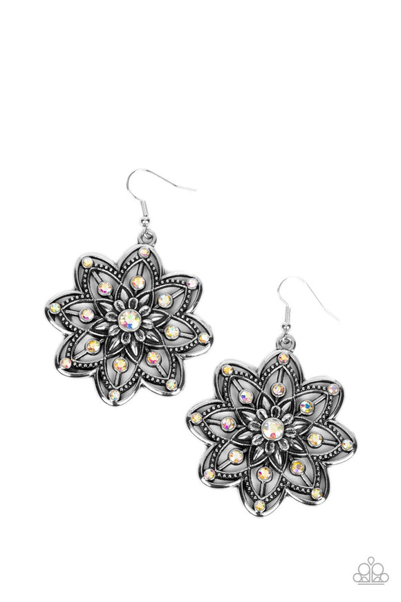 Dotted in iridescent rhinestones, rows of smooth and studded silver petals bloom from an iridescent rhinestone center for a whimsical floral fashion. Earring attaches to a standard fishhook fitting. Due to its prismatic palette, color may vary.