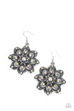 Dotted in iridescent rhinestones, rows of smooth and studded silver petals bloom from an iridescent rhinestone center for a whimsical floral fashion. Earring attaches to a standard fishhook fitting. Due to its prismatic palette, color may vary.