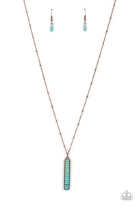 A refreshing collection of dainty turquoise stone discs stack inside a rectangular copper frame, creating a rustic pendant as it sways at the end of a lengthened dainty copper satellite chain. Features an adjustable clasp closure.