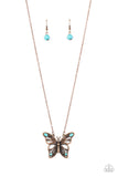 Accented in oval turquoise stones, a decorative copper butterfly flutters at the bottom of a copper chain for a free-spirited finish. Features an adjustable clasp closure.