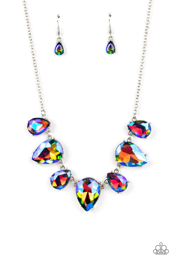 Featuring a stellar iridescence, an oversized collection of glittery blue teardrop gems alternates upside down and right-side up below the collar for an out-of-this-world sparkle. Features an adjustable clasp closure. Due to its prismatic palette, color may vary.