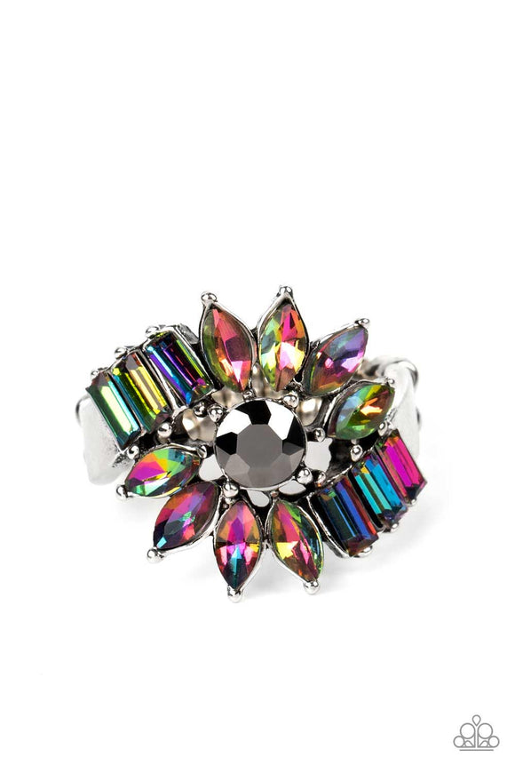 Marquise-cut rhinestone petals, splashed in an oil spill finish, fan out in an abstract manner around a hematite center. Dramatic emerald-cuts, set in a similar oil spill shade, fall in line along twisting bands of silver, exploding into a stellar centerpiece atop the finger. Features a stretchy band for a flexible fit. Due to its prismatic palette, color may vary.  Sold as one individual rin