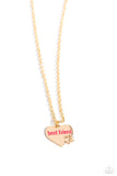 A sleek gold heart frame, embellished with a gold paw print, swings from the bottom of a dainty gold chain, creating a pet-inspired pendant. Splashed in a vibrant pink hue, the words "best friend" are featured in the center of the pendant for a pop of fun-loving color. Features an adjustable clasp closure.  Sold as one individual necklace. Includes one pair of matching earrings.