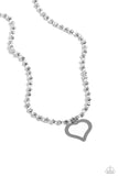 Infused along an invisible string, a collection of faceted hematite beads alternate with clear seed beads to create a dazzling display below the neckline. An airy silver heart dangles from the high-sheen display for a touch of charm. Features an adjustable clasp closur