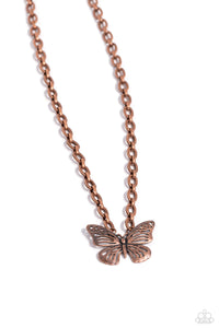 Featuring airy cutout details, an antiqued copper butterfly is connected to the bottom of a thick copper link chain for a whimsically monochromatic statement. Features an adjustable clasp closure.  Sold as one individual necklace. Includes one pair of matching earrings.