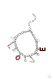 Dangling along a silver link chain, silver letters with various Valentine's-inspired details spell out the word "LOVE" as they alternate alongside solitaire white rhinestones and white pearls in a flattering finish around the wrist. The "L" features a baby pink background with fuchsia rhinestones and white pearls, the "O" features red-painted hearts, the "V" features stripes of white and baby pink, and the "E" features a red glitter backdrop. Features an adjustable clasp closure.