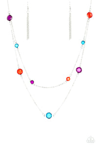 Varying in size, glassy multicolored gems trickle along dainty silver chains, creating sparkling layers across the chest. Features an adjustable clasp closure.  Sold as one individual necklace. Includes one pair of matching ear