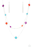 Varying in size, glassy multicolored gems trickle along dainty silver chains, creating sparkling layers across the chest. Features an adjustable clasp closure.  Sold as one individual necklace. Includes one pair of matching ear